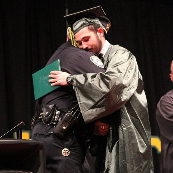 A cop shows up at a young boy’s graduation a week after giving him the worst news of his life